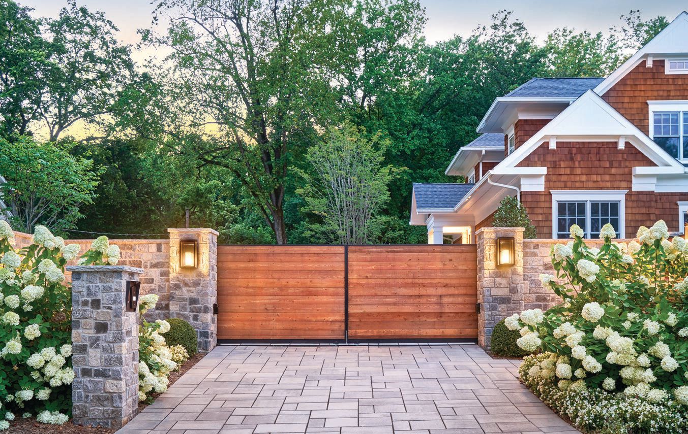 Techo-Bloc Blu 80 driveway pavers are flanked by hydrangeas. PHOTO BY CURT PULLEYBLANK