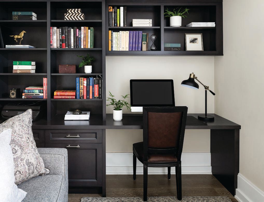 A cozy but efficient office space is complemented by a spot for lounging. PHOTOGRAPHED BY ROBERT RADIFERA