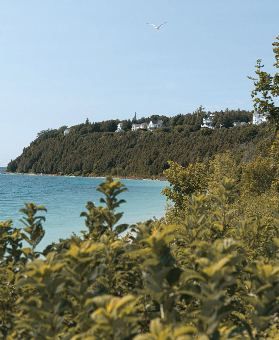 One of the gems of the Great Lakes region, Mackinac Island beckons with historic sites, nature aplenty and views of the Straits of Mackinac. PHOTO BY CAMERON STEWART/UNSPLASH